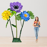 Flourishing Growth Giant Flower Backdrop – Featuring Yellow Marigolds, Blue Water Lilies, and Lavender Anemones